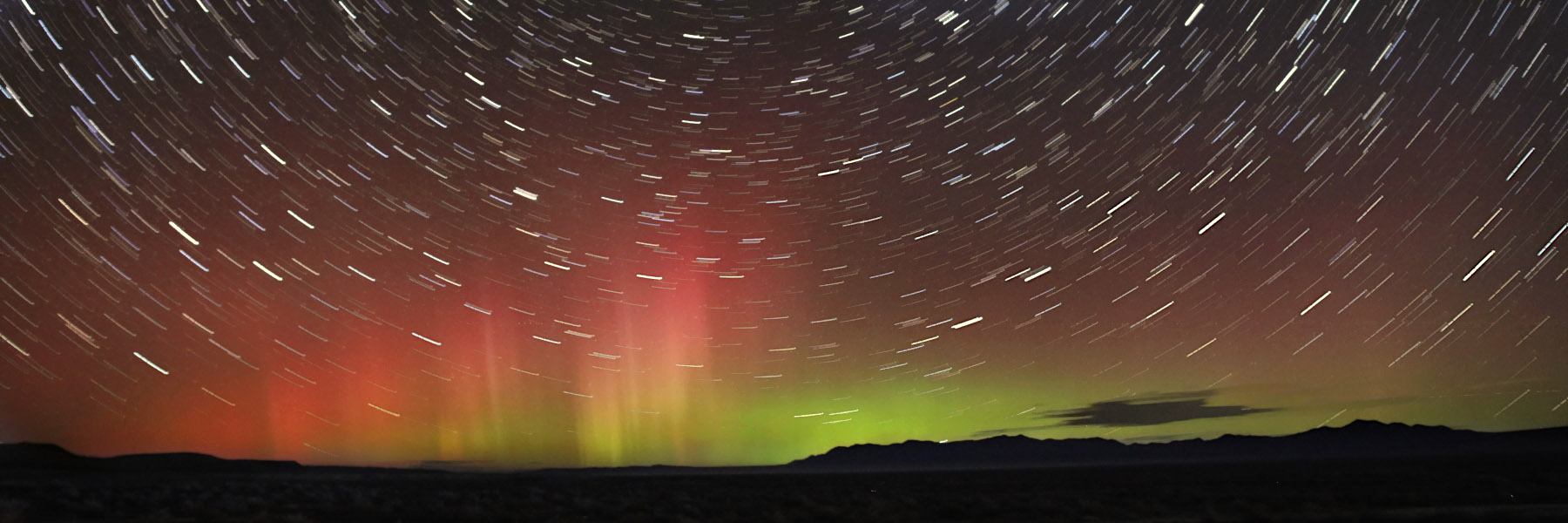 Night sky time lapse with aurora borealis