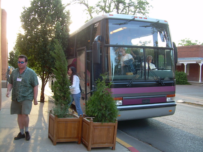 CEDAR Bus from Fort Marcy Getting off the bus at the Eldorado Hotel before the reception.