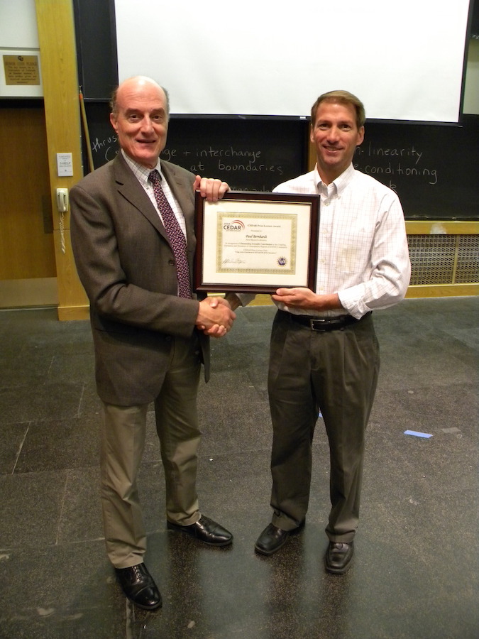 Paul Bernhardt (NRL) receives his 2010 CEDAR Prize Lecture plaque from CEDAR Chair Jeff Thayer (U CO)
