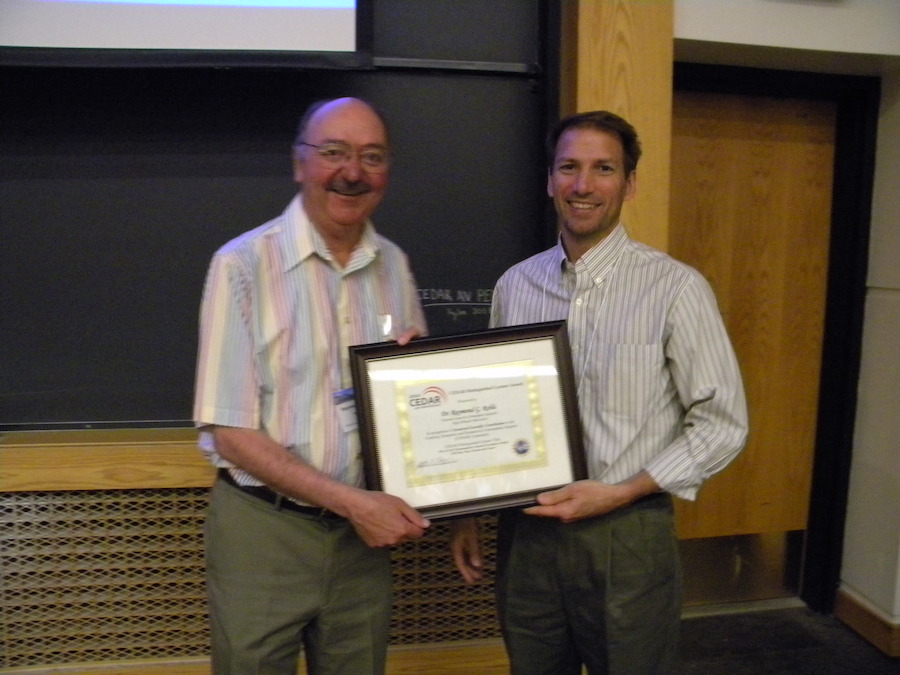 Ray Roble (NCAR) receives the first CEDAR Distinguished Lecture plaque from CEDAR Chair Jeff Thayer (U CO)