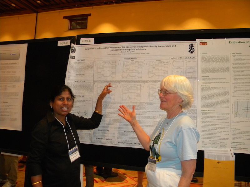 Sasmita Mohapatra recent graduate from the University of Texas at Dallas explains her EQIT-14 poster to Barbara Emery of the National Center for Atmospheric Research.