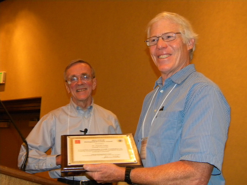 #2 Distinguished Lecturer Donald Farley of Cornell receives his certificate from CSSC Chair John Foster of MIT.