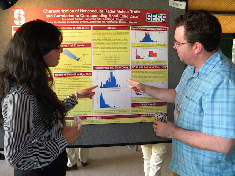 Ana Maria Tarano (Stanford) explains her poster #METR-06 to Jeff Klenzing (GSFC).