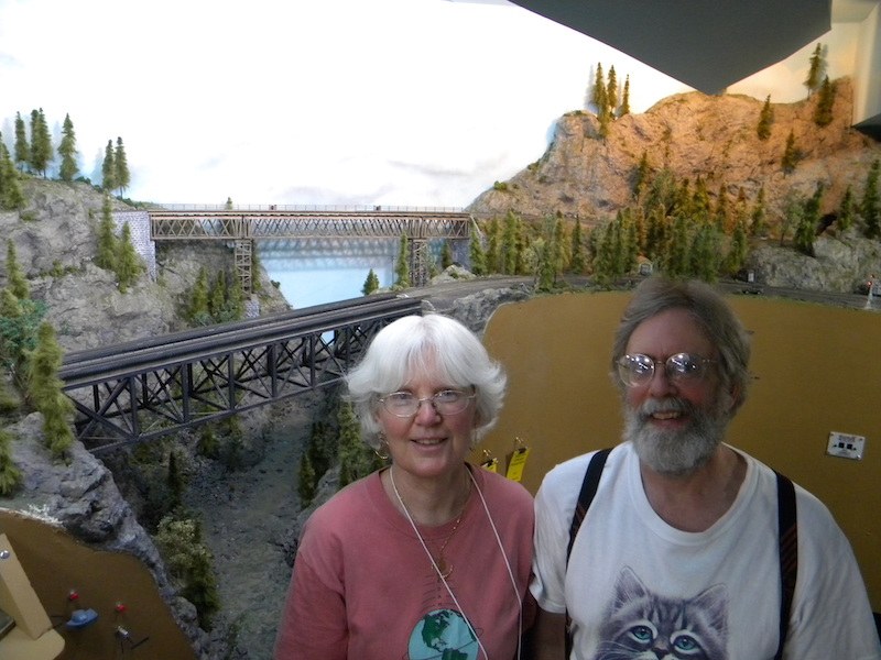 Barbara Emery (CEDAR organizer, NCAR) and husband Doug Geiger at the CEDAR open-house of their model railroad in Longmont on Wednesday June 26, 2013.