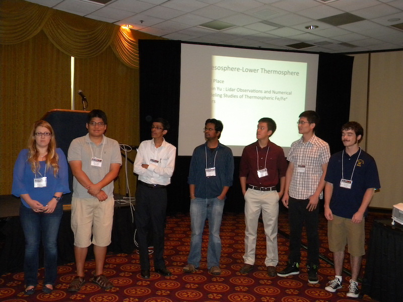 7 IT and MLT winners. Left to right: Burcu Kosar (FIT, MLT second place, second place in 2011), Enrique Rojas Villalba (JRO, IT second place), Nithin Sivadas (IIT, India, 1 or 2 IT honorable mentions), Bharat Kunduri (VT, IT first place), Vu Nguyen (U CO, MLT honorable mention), Zhibin Yu (U CO, MLT first place), Thomas Stephen Ehrmann (ERAU, MLT honorable mention)