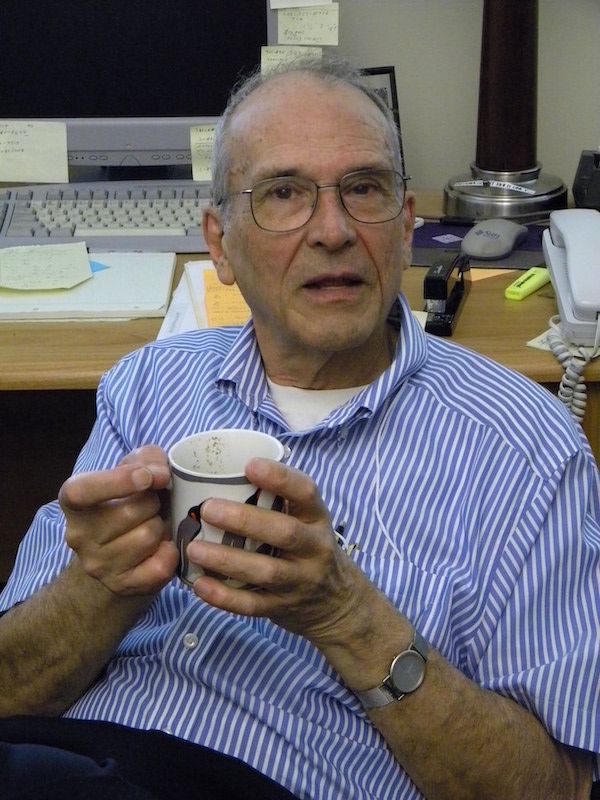 Gonzalo Hernandez (U WA, died July 15, 2014) enjoys tea in his office.