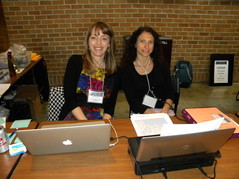 VSP UCAR staff Kendra Greb (left) and Silvia Agnona behind the registration desk.