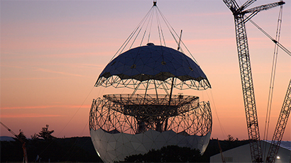 Crane building a science dish