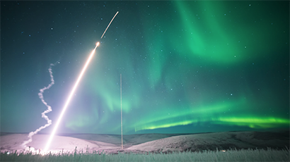 Aurora borealis and a rocket shooting