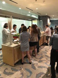 Cedar attendees at dinner buffet